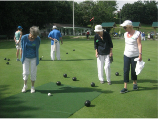 Photo of  members counting the bowls in a game